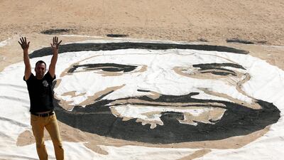 The Canadian-born artist Sylvain Tremblay created a massive portrait of Sheikh Zayed in the desert near Dubai. Pawan Singh / The National