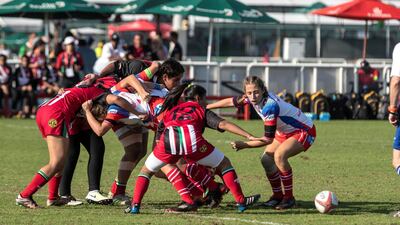 Al Maha School girls team in action.