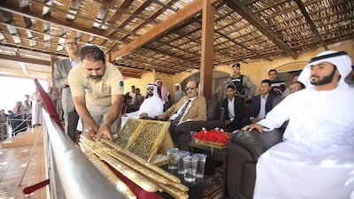 Emirati and Jordanian officials attend as Jordanian Bedouins prepare to race camels using robotic jockeys at the Sheikh Zayed track in the town of al-Disi in the desert of Wadi Rum valley, on November 9, 2019. All pictures by The National