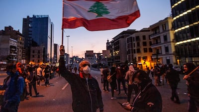 Anti-government protesters attend a protest against the collapsing Lebanese pound currency and the price hikes of goods in Beirut. EPA