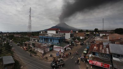 Mount Sinabung volcano during a fresh eruption today. Thousands of villagers fled after a series of volcanic eruptions on Indonesia's Sumatra island. Ade Sinujai / AFP Photo