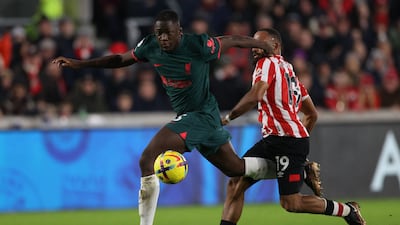 Bryan Mbeumo challenges Liverpool defender Ibrahima Konate ahead of scoring Brentford's third goal. AFP
