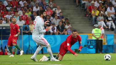 Soccer Football - World Cup - Group B - Portugal vs Spain - Fisht Stadium, Sochi, Russia - June 15, 2018 Portugal's Cristiano Ronaldo is fouled by Spain's Gerard Pique REUTERS/Hannah McKay