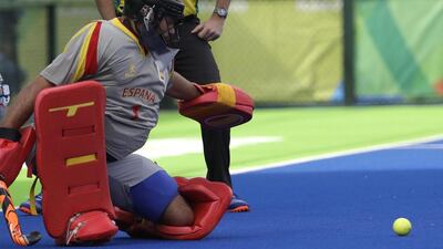 Spain’s goalkeeper Quico Cortes, tries to save the ball against Belgium during a men’s field hockey match at 2016 Summer Olympics in Rio de Janeiro, Brazil, Thursday, August 11, 2016. Hussein Malla / AP Photo