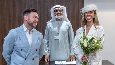 British couple Craig Lindsay and Sarah Goodman marry in a civil ceremony in February 2022. Victor Besa / The National