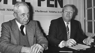 Jean-Marie Le Pen, prospective presidential candidate and Front National leader, with Philippe Marais, former parliamentary representative for Algiers and head of the committee supporting Mr Le Pen's candidacy, in Paris in March 1981. Mr Le Pen did not obtain the 500 signatures necessary to run for the presidential elections. AFP