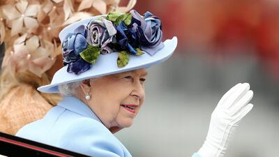 Queen Elizabeth II waves to the crowds as she arrives on Day 1 of Royal Ascot. Getty Images