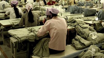 Workers at a garment factory in South East Asia. iStockphoto.com