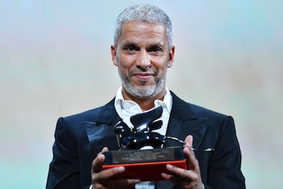 Tunisian actor Sami Bouajila holds the Orizzonti Award for Best Actor for his role in 'A Son' at the 2019 Venice Film Festival. AFP