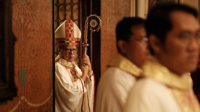 Jakarta's Archbishop Cardinal Ignatius Suharyo Hardjoatmodjo waits to lead the Christmas Mass at Jakarta Cathedral in Jakarta. AFP