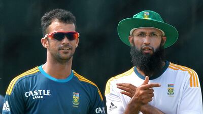 With senior players such as JP Duminy by his side, Hashim Amla, right and below, won in Sri Lanka on his debut series as captain. Ishara Kodikara / AFP
