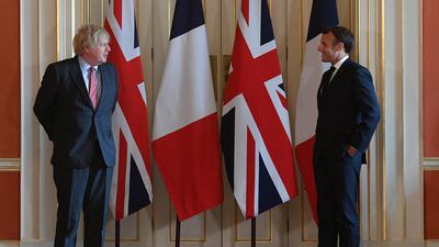 British Prime Minister Boris Johnson and French President Emmanuel Macron pose at 10 Downing Street. Getty Images