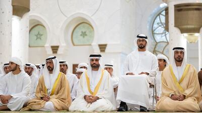 Sheikh Khalifa bin Tahnoon, Chairman of the Abu Dhabi Crown Prince's Court, Sheikh Zayed bin Mansour, and Sheikh Hilal bin Theyab attend prayers.