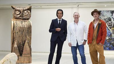 Actor Brad Pitt, right, and musician Nick Cave, left, with British artist Thomas Houseago at the opening of the exhibition 'Thomas Houseago - WE with Nick Cave and Brad Bitt' where Pitt debuted nine sculptures and Cave showed 17 glazed ceramics. AFP