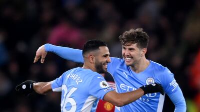 Riyad Mahrez celebrates with John Stones after scoring the fourth. Getty