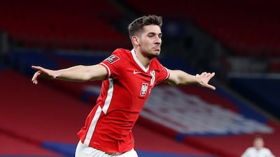 Poland's Jakub Moder celebrates scoring their goal. Reuters
