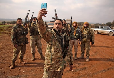 The Syrian conflict has been referred to as the first "smartphone war". Aaref Watad / AFP