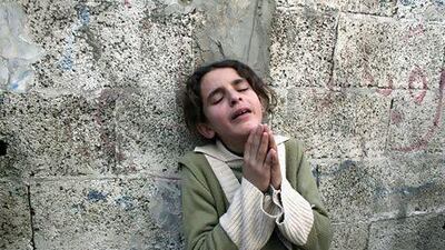 A young Palestinian girl weeps during the funeral of Muhmmad Salman in the Beit Lahiya neighborhood of the Gaza strip on November 16.