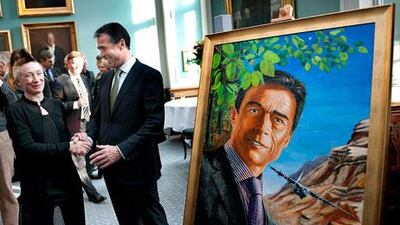 The artist Simone Aaberg Kaern with Anders Fogh Rasmussen, the Nato secretary general and former Danish prime minister, at the unveiling of her portrait of him. She is now Denmark’s official war artist in Libya