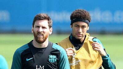 Lionel Messi, left, and Neymar in training ahead of Barcelona's Uefa Champions League quarter-final second leg with Juventus on Wednesday. Albert Gea / Reuters