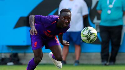 Liverpool's Naby Keita chases the ball. Reuters