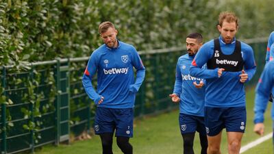 Andriy Yarmolenko, Manuel Lanzini and Craig Dawson during training. Reuters