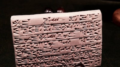 Clay tablet with a passage from the 'Epic of Gilgamesh', a poem from ancient Mesopotamia.