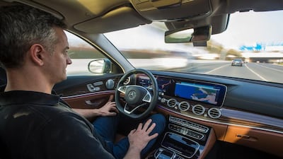 Dr Andreas Wedel is in the driver’s seat as the Mercedes E-300 makes its autonomous drive from Dubai to Abu Dhabi on the E11, in November. Courtesy Mercedes-Benz Cars Middle East.