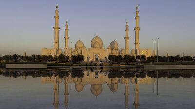Sheikh Zayed Grand Mosque in Abu Dhabi at sunrise on the first day of Ramadan. Christopher Pike / The National