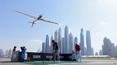 Sergio Garcia, left, and Anirban Lahiri play closest to the pin on the runway of SkyDubai runway. Courtesy Golf in Dubai