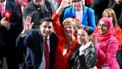 Scottish Labour leader Anas Sarwar celebrates with Maureen Burke after she won in Glasgow North East. Reuters