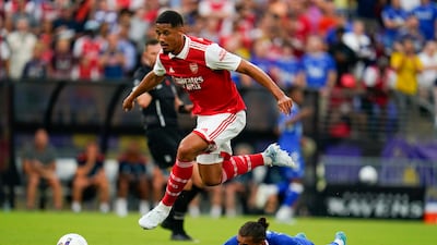 Arsenal forward William Saliba, top, leaps over Everton forward Dominic Calvert-Lewin in Baltimore. AP
