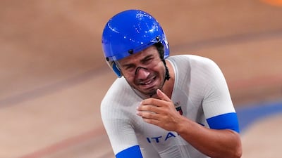 Francesco Lamon of Team Italy reacts after winning the gold medal during the track cycling men's team pursuit.