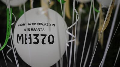 Balloons with the name of the missing Malaysia Airlines ill-fated flight MH370 are seen displayed during a memorial event in Kuala Lumpur on March 6, 2016. Mohd Rasfan / AFP Photo