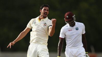 Mitchell Starc of Australia celebrates after taking the wicket of Devendra Bishoo of West Indies during their win on Day 3 of the first Test in Dominica. Ryan Pierse / Getty Images / June 5, 2015