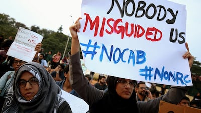 Indian protesters hold placards and shout slogans during a protest in solidarity with Jamia Millia Islamia University students and against the Citizenship Amendment Bill (CAB) and National Register of Citizens (NRC), in Bangalore, India, 20 December 2019. EPA/JAGADEESH NV