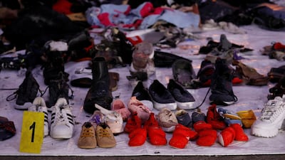 Recovered shoes believed to be from the crashed Lion Air flight JT610 are laid out at Tanjung Priok port in Jakarta. REUTERS