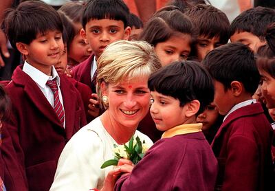 Diana, Princess of Wales meeting children during her visit to the Hindu temple Neasden, north London on June 6, 1997. EPA