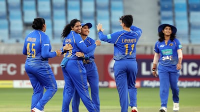 UAE's Suraksha Kotte after taking the wicket of Indonesia's Maria Corazon