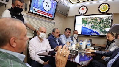 Turkish President Recep Tayyip Erdogan discusses the wildfires with his ministers in Manavgat.