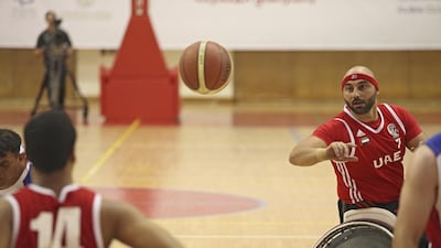 The UAE's men's wheelchair basketball team in action against Jordan at Al Ahli Sports Club in Dubai. Lee Hoagland / The National