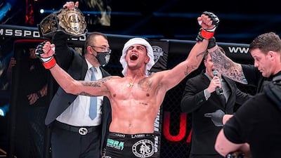 Bruno Machado celebrates after unanimous decision against Frenchman Mickael Lebout to win the UAE Warriors lightweight title in January 2021. Photo: UAE Warriors