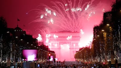 Fireworks illuminate the Arc de Triomphe during New Year's Eve celebrations on the Champs-Elysees in 2017. AP