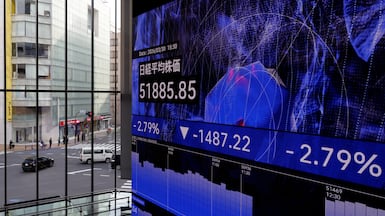 A stock indicator board in Tokyo. There was much volatility on Japan's Nikkei last month due to the surge in worldwide oil prices. EPA