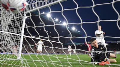 Leeds United's French goalkeeper Illan Meslier sees the ball hit the back of his net as Liverpool's Dutch striker Cody Gakpo (not pictured) scores the opening goal. AFP