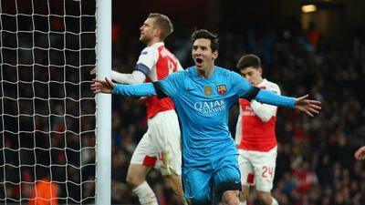 LONDON, ENGLAND - FEBRUARY 23: Lionel Messi of Barcelona celebrates scoring the opening goal during the UEFA Champions League round of 16 first leg match between Arsenal and Barcelona on February 23, 2016 in London, United Kingdom. (Photo by Paul Gilham/Getty Images)