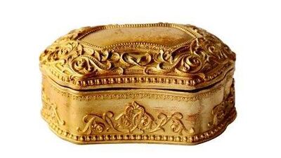 An antique gold jewellery box from 2XL Furniture & Home Decor helps mum keep her bling in order.