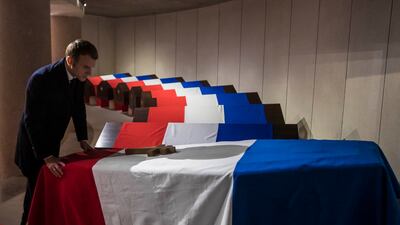 French President Emmanuel Macron pays his tribute at Mont Valerien to Resistance fighter Hubert Germain on Thursday. AP