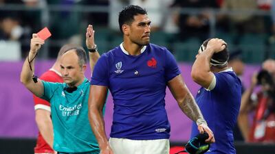 Referee Jaco Peyper shows a red card to France's Sebastien Vahaamahina during the Rugby World Cup quarter-final at Oita Stadium on Sunday. AP