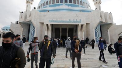 Worshipers leave after performing Friday prayers at King Abdullah Mosque, after the government allowed worshipers to walk to mosques in Amman, Jordan. Reuters